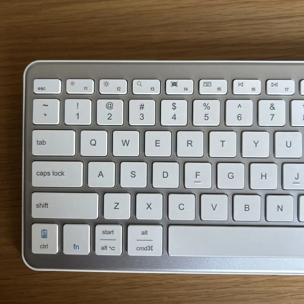 Qulose Bluetooth Ultra-Slim Keyboard for iOS, Windows, Android Rechargeable